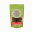 Sachet recyclable vert de friandises naturelles pour chat et chien à la pomme, marque Encas-Nimaux, design artisanal et écoresponsable.